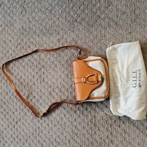 Gili orange and cream purse. Brand new
